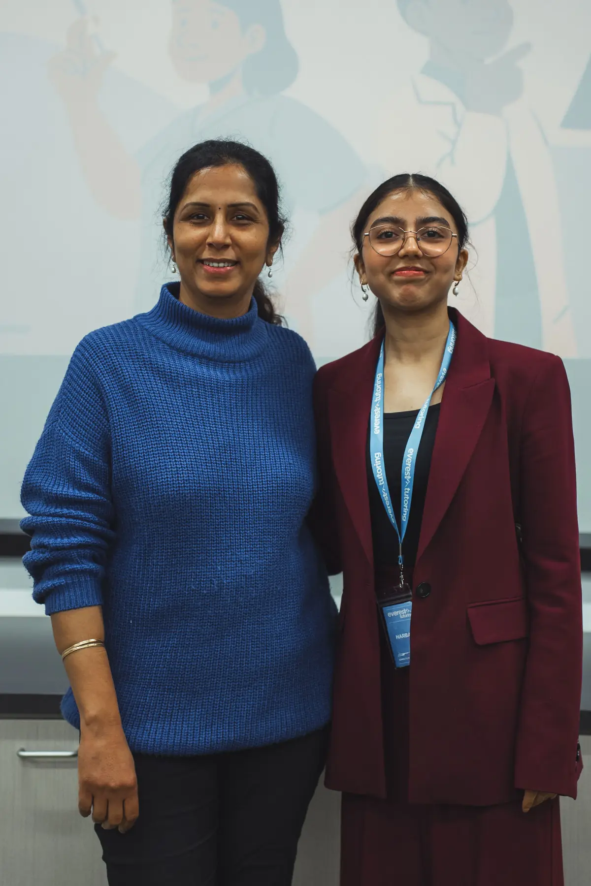 A parent and student at an Everest information session