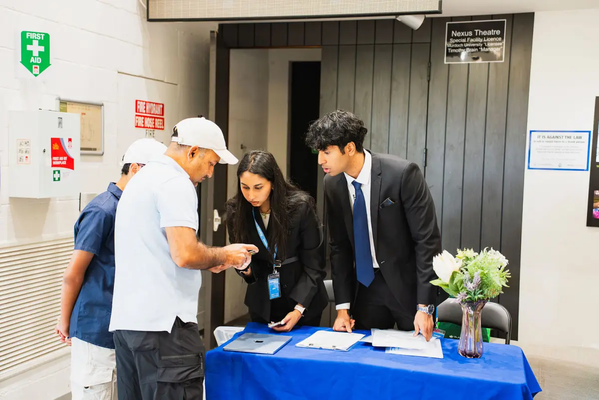 Students signing in at the Everest registration desk