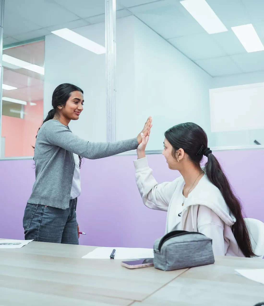 An Everest tutor and student celebrating a result