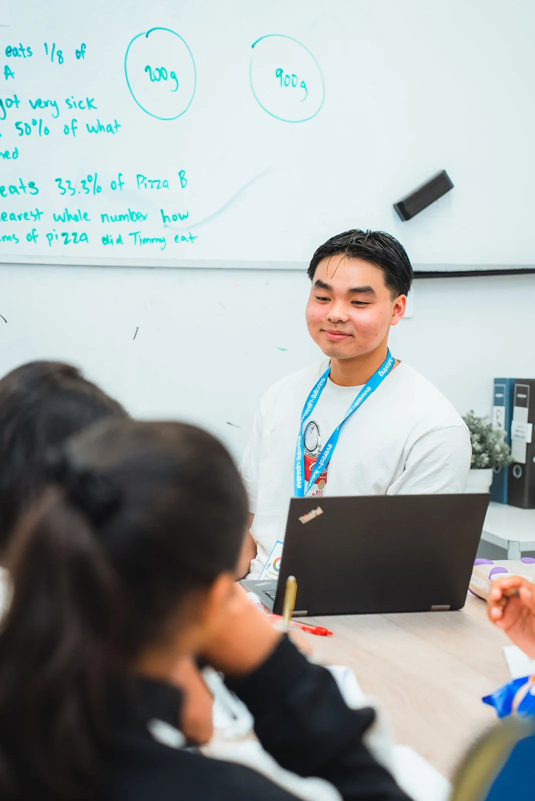 An Everest tutor teaching a live online class from a laptop